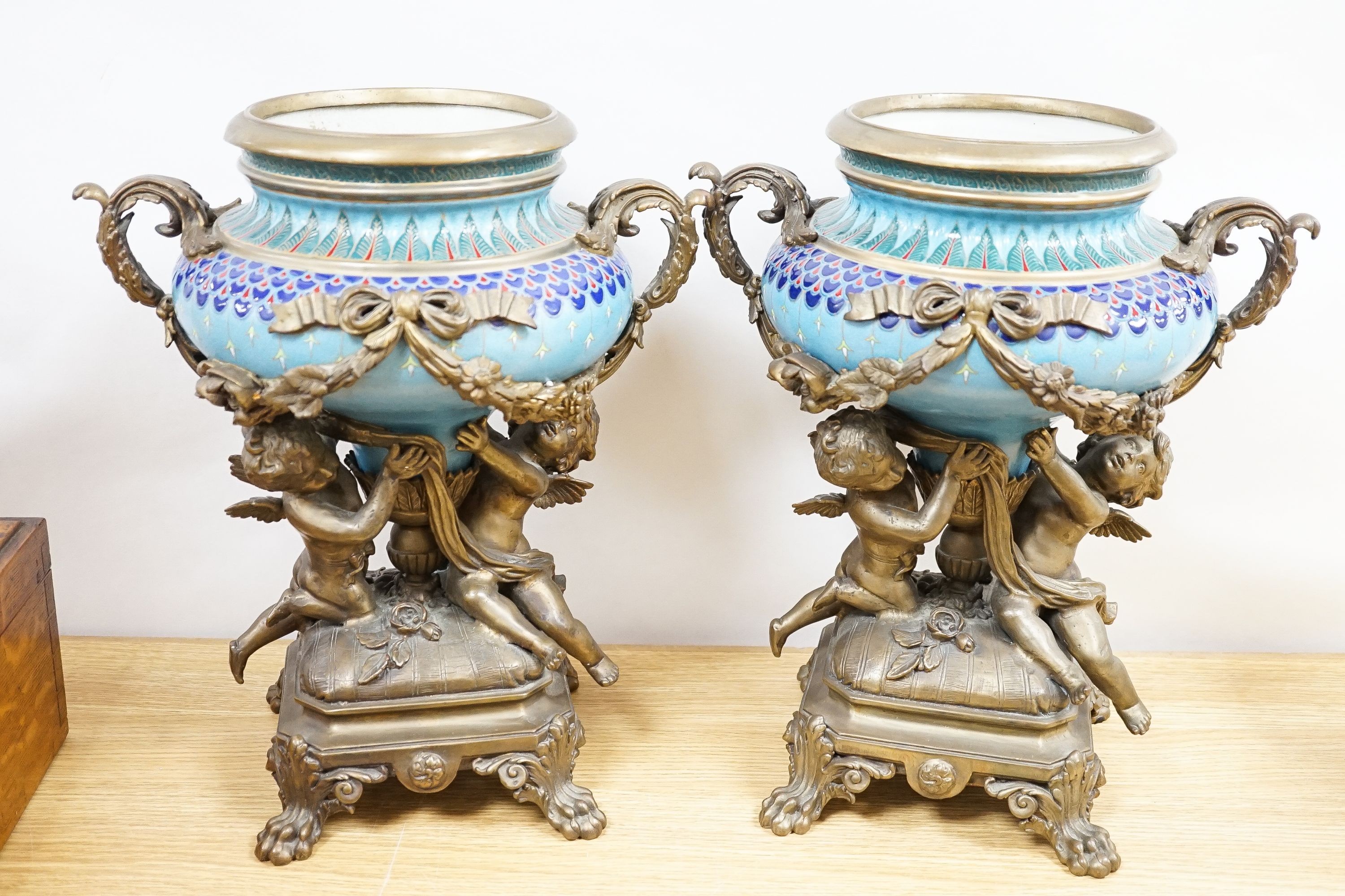 A pair of large ormolu mounted earthenware vases 39cm